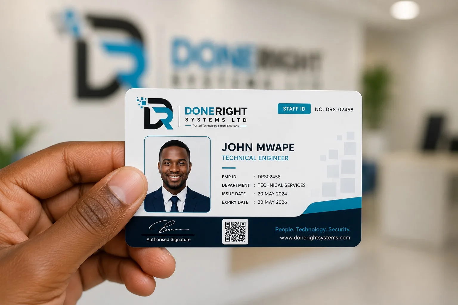 An issued staff ID card held in an office
